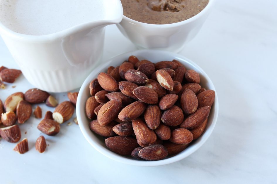 Almonds , almond butter and almond milk concept