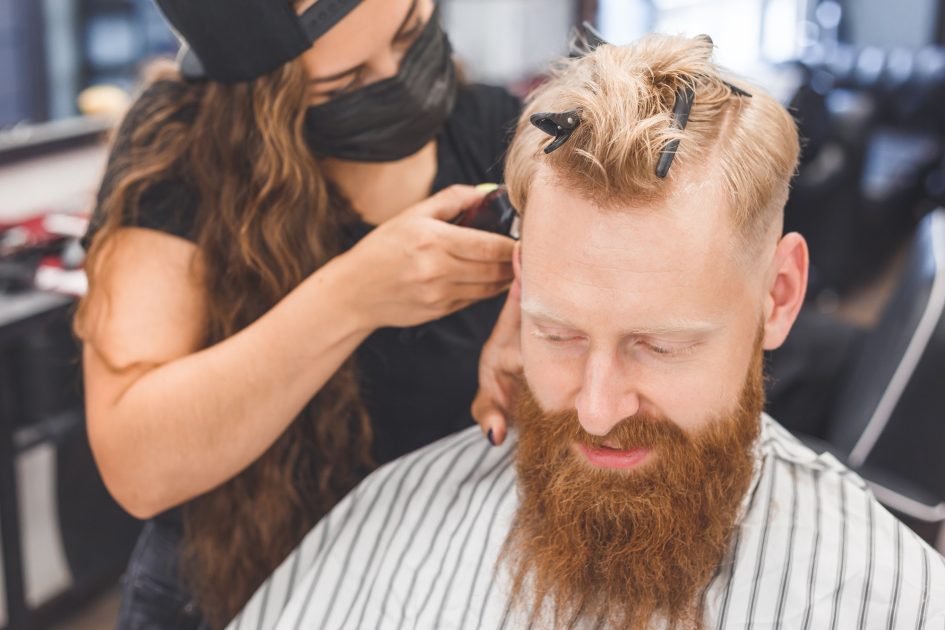 Men's grooming in a barbershop. Hair care
