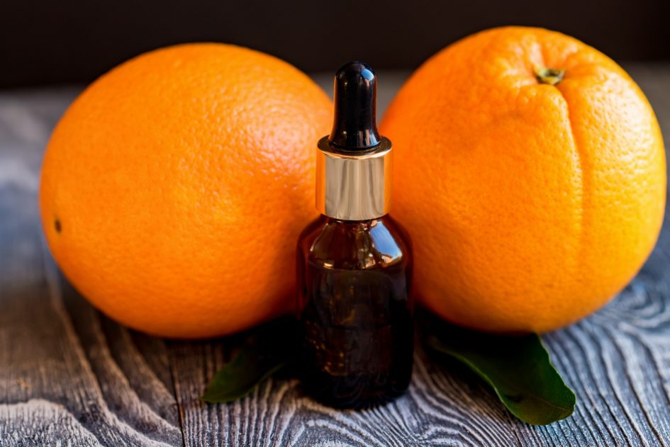 Dropper bottle of orange essential oil