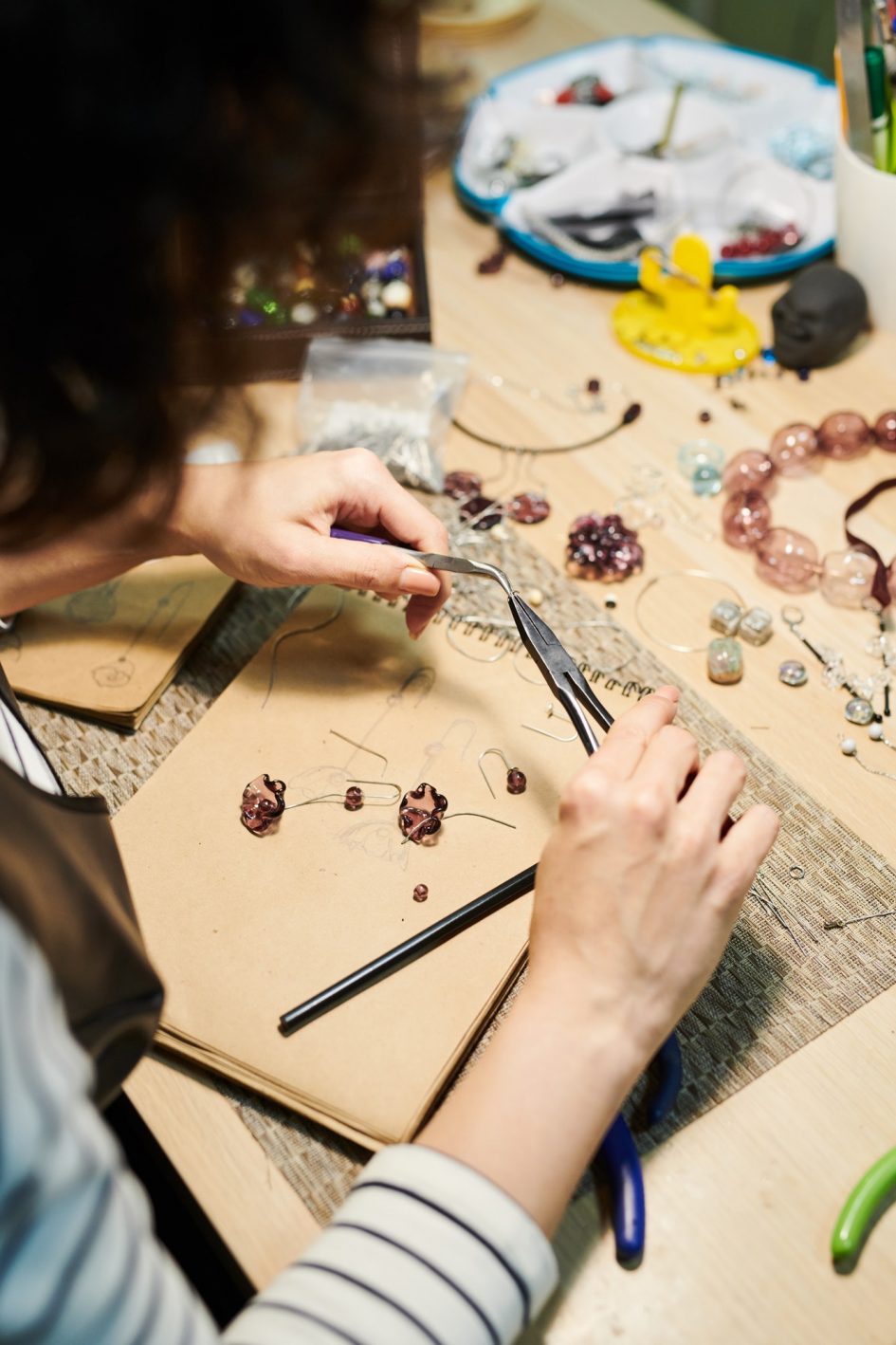 Woman Creating Glass Jewelry