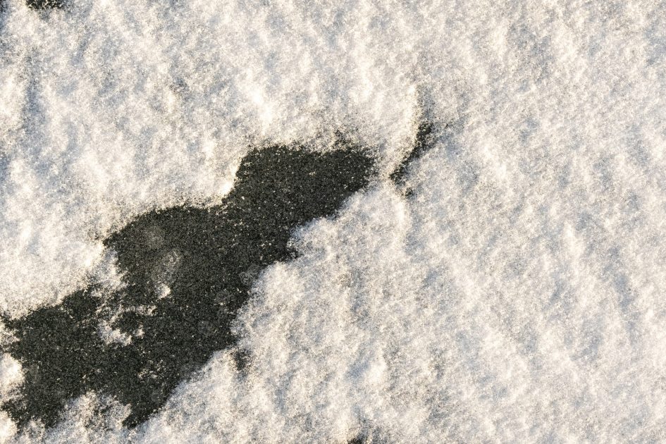 snow background. Snow lying on the ice. Snow texture
